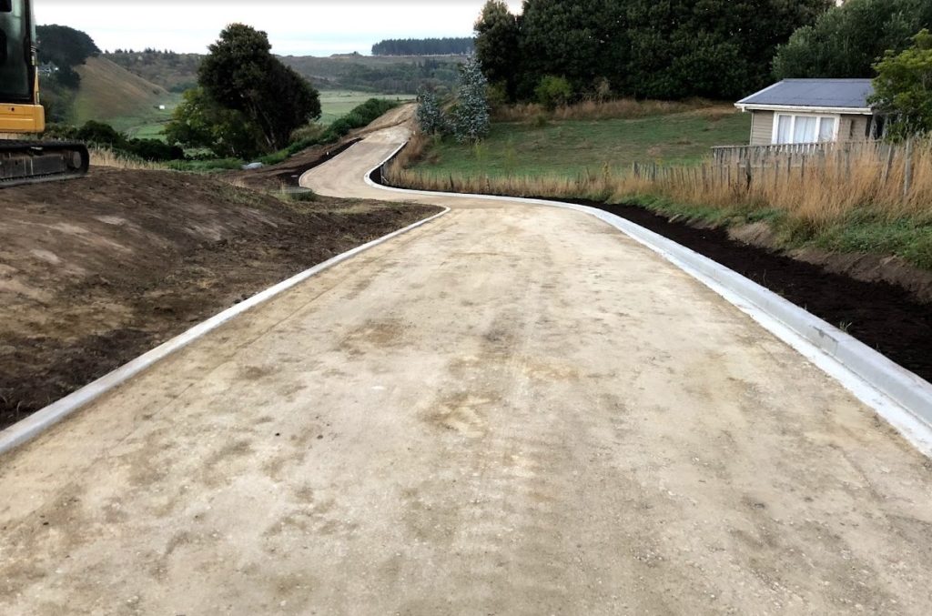 Road construction and surfacing by Loaders